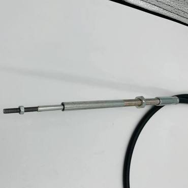 Трос регулировки оборотов мотовила 4464928 Volvo 830 - 730 мм.